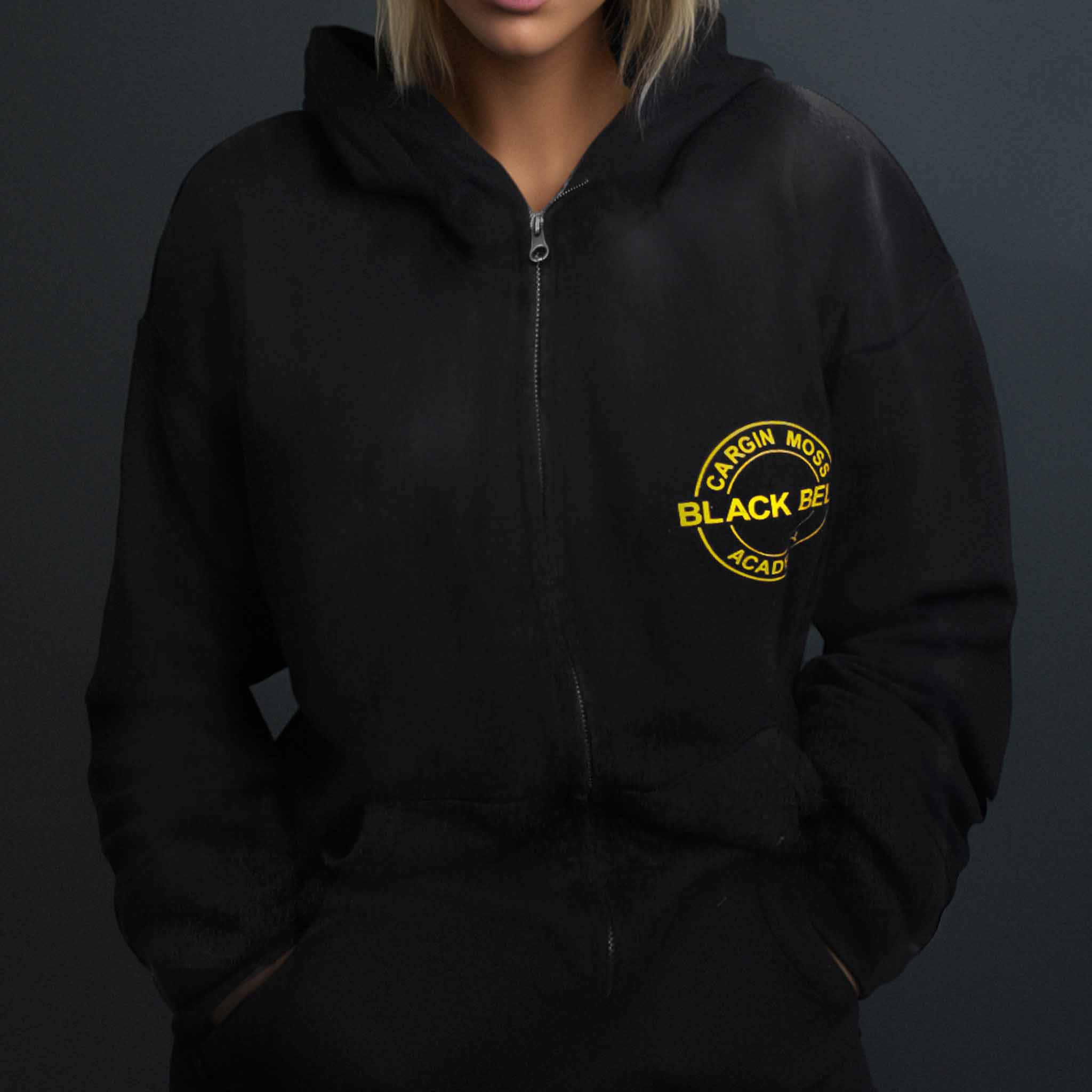 a cool black hoodie that shows that you support the CMBBA club for martial arts